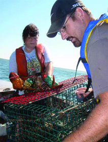 Carol Thompson and Royden Messer, mother and son, with their catch of lobsters